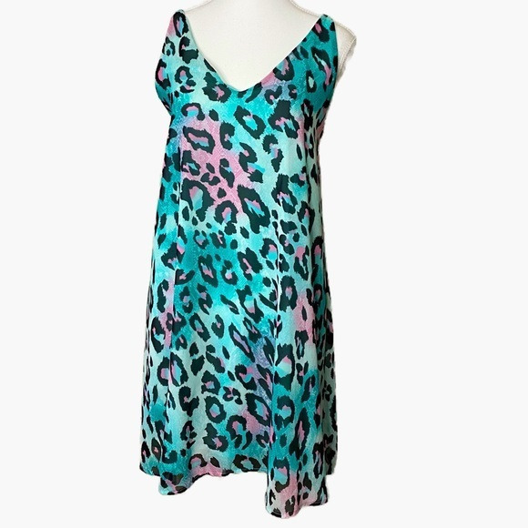 Adrienne Dresses & Skirts - Adrienne Jade Leopard Swing Mini Dress‎
